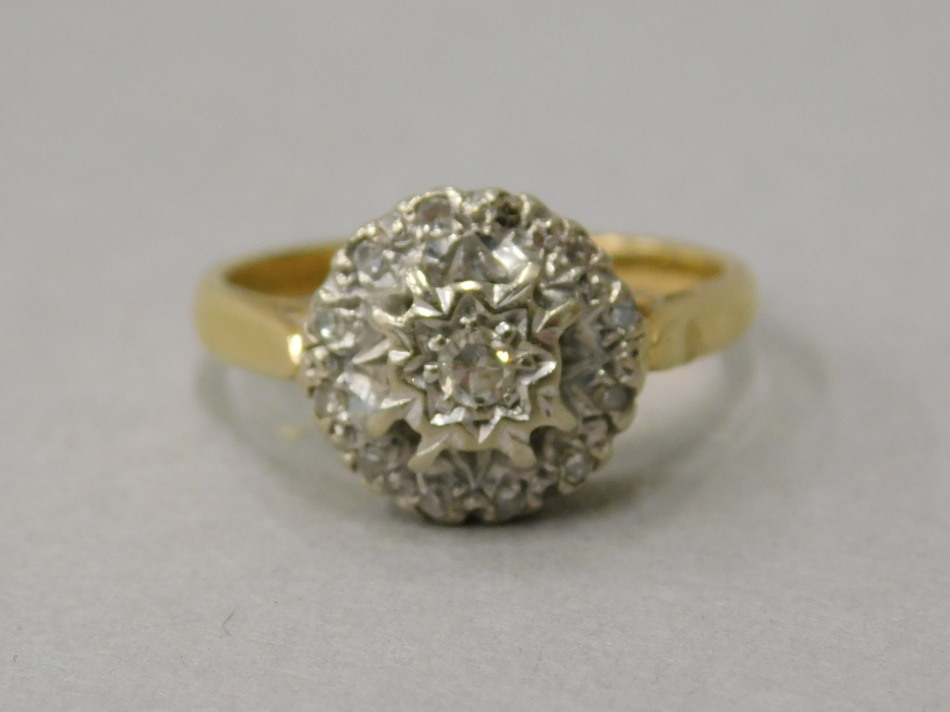 Appraisal: An ct gold diamond dress ring with central tiny diamond