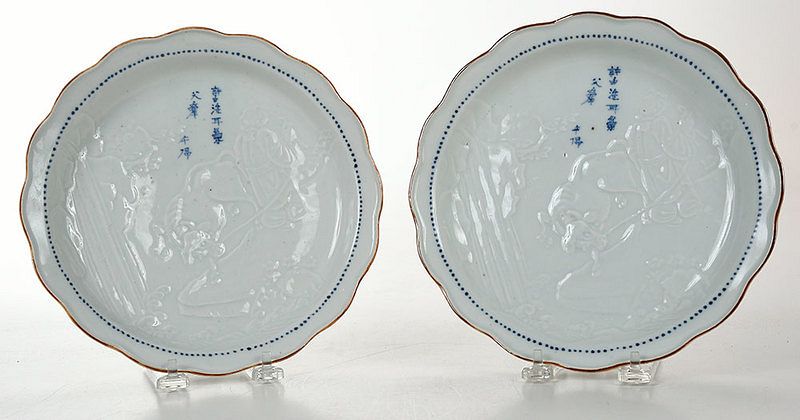 Appraisal: Pair Asian Porcelain Plates with Inscriptions depicting a man and