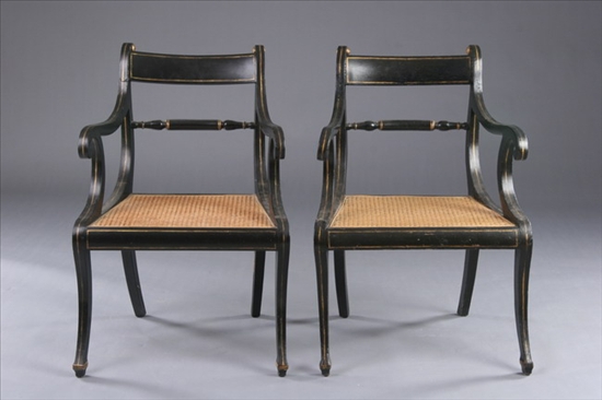 Appraisal: PAIR REGENCY STYLE EBONIZED AND CANE ARMCHAIRS th century Rectangular