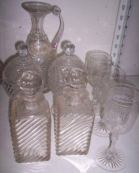 Appraisal: A latticino glass carafe two cut glass confitures and covers