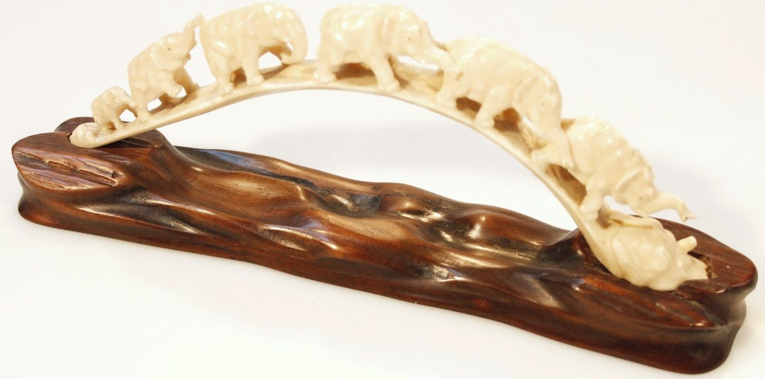 Appraisal: An early thC carved ivory tusk formed as six graduated