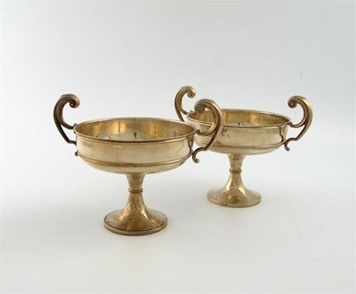 Appraisal: A pair of Edwardian silver two-handled tazzae by A and