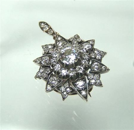 Appraisal: A Victorian diamond set pendant brooch designed as a floral