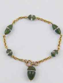 Appraisal: A Russian ct gold bracelet with nephrite jade and rock