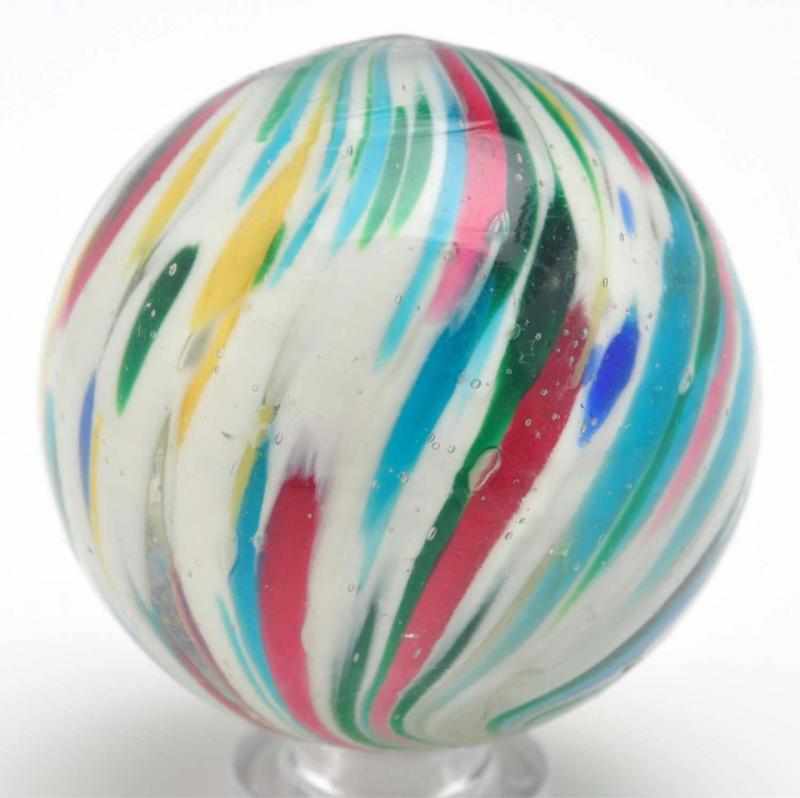 Appraisal: Onionskin Clown Marble Description White base onionskin with spotting and