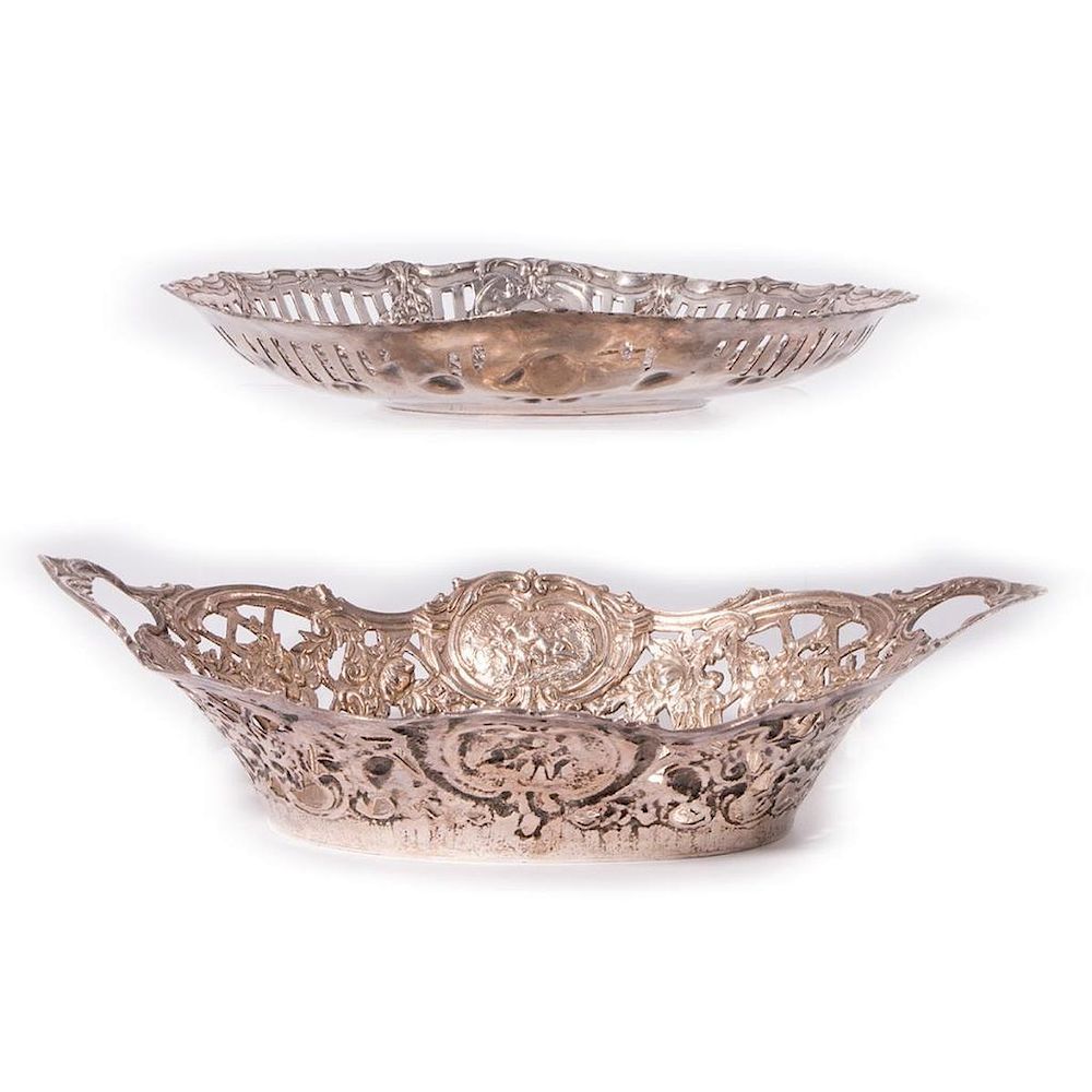 Appraisal: Two Silver Repousse' Oval Bowls Handled Repousse' Bowl marked on