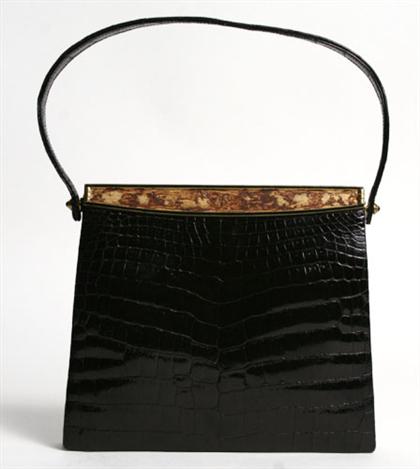 Appraisal: Black French alligator purse s With top handle and fine