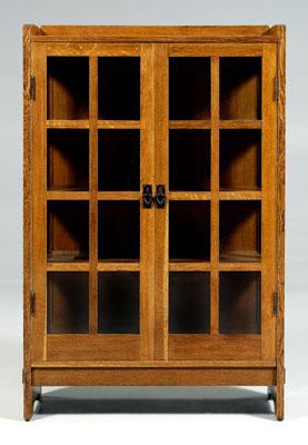 Appraisal: Stickley Arts and Crafts oak bookcase two doors with copper