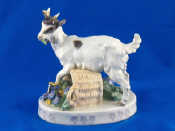 Appraisal: A Meissen figure of a goat with flower basket one