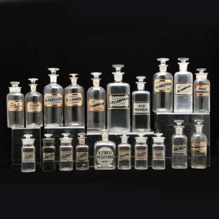 Appraisal: An Assortment of Glass Apothecary Bottles th century clear glass