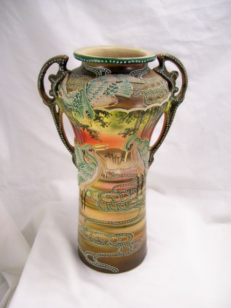 Appraisal: Satsuma Style Vase Double handled stoneware with a raised bird