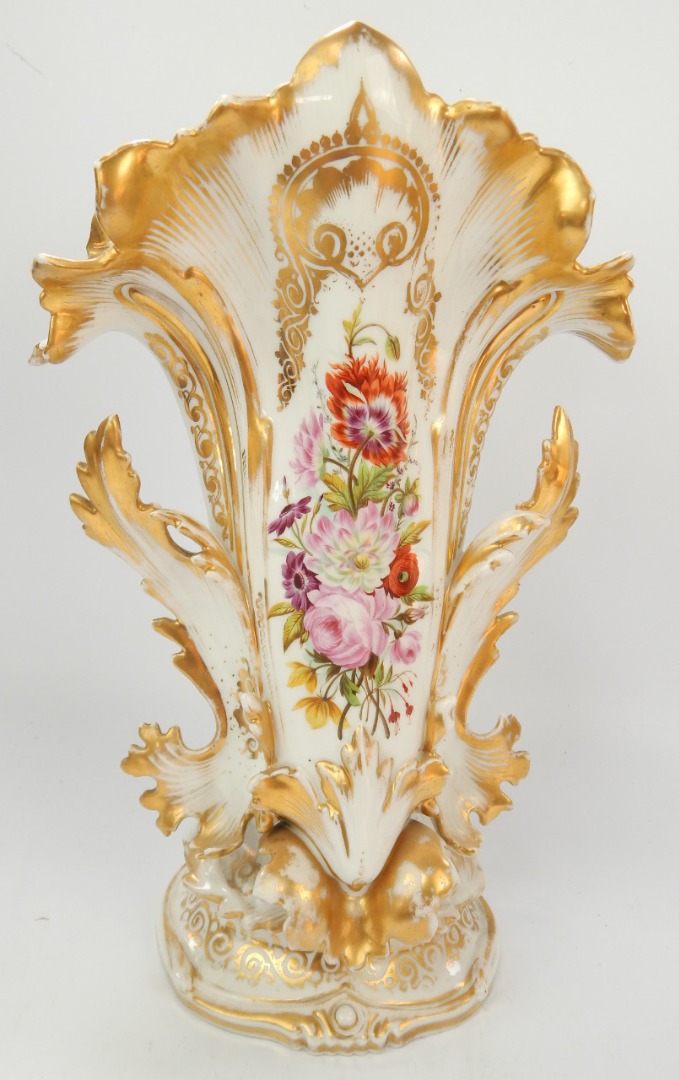 Appraisal: A thC porcelain vase of rococo scroll design painted with