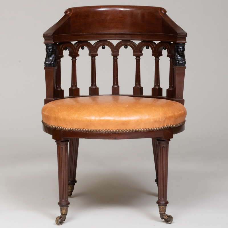 Appraisal: RARE DIRECTOIRE MAHOGANY AND EBONIZED FAUTEUIL DE BUREAU ATTRIBUTED TO