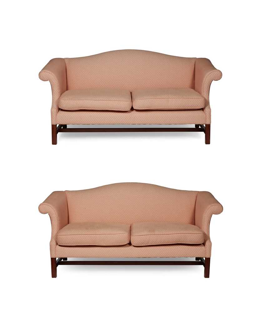 Appraisal: PAIR OF GEORGIAN STYLE CAMELBACK SOFAS MODERN with twin cushion