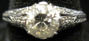 Appraisal: Edwardian platinum and diamond engagement rings et with a round