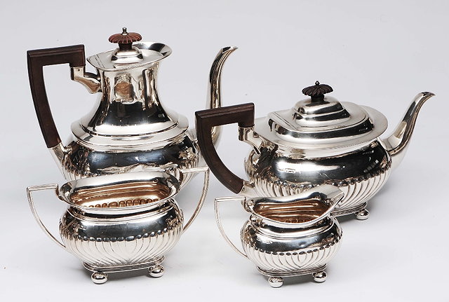 Appraisal: A silver four piece tea and coffee serviceof half fluted