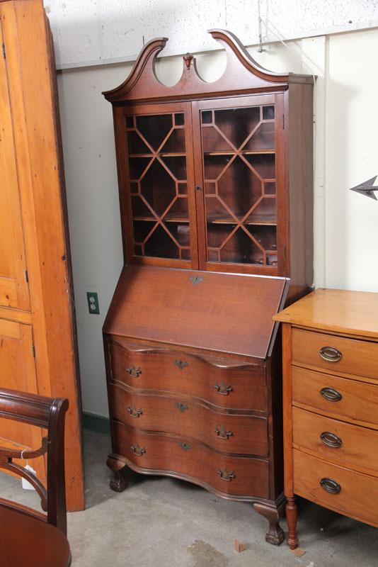 Appraisal: SECRETARY BOOKCASE Mahogany with a broken arch pediment glazed doors