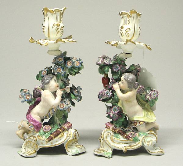 Appraisal: A pair of Chelsea porcelain figural candlesticks third quarter th