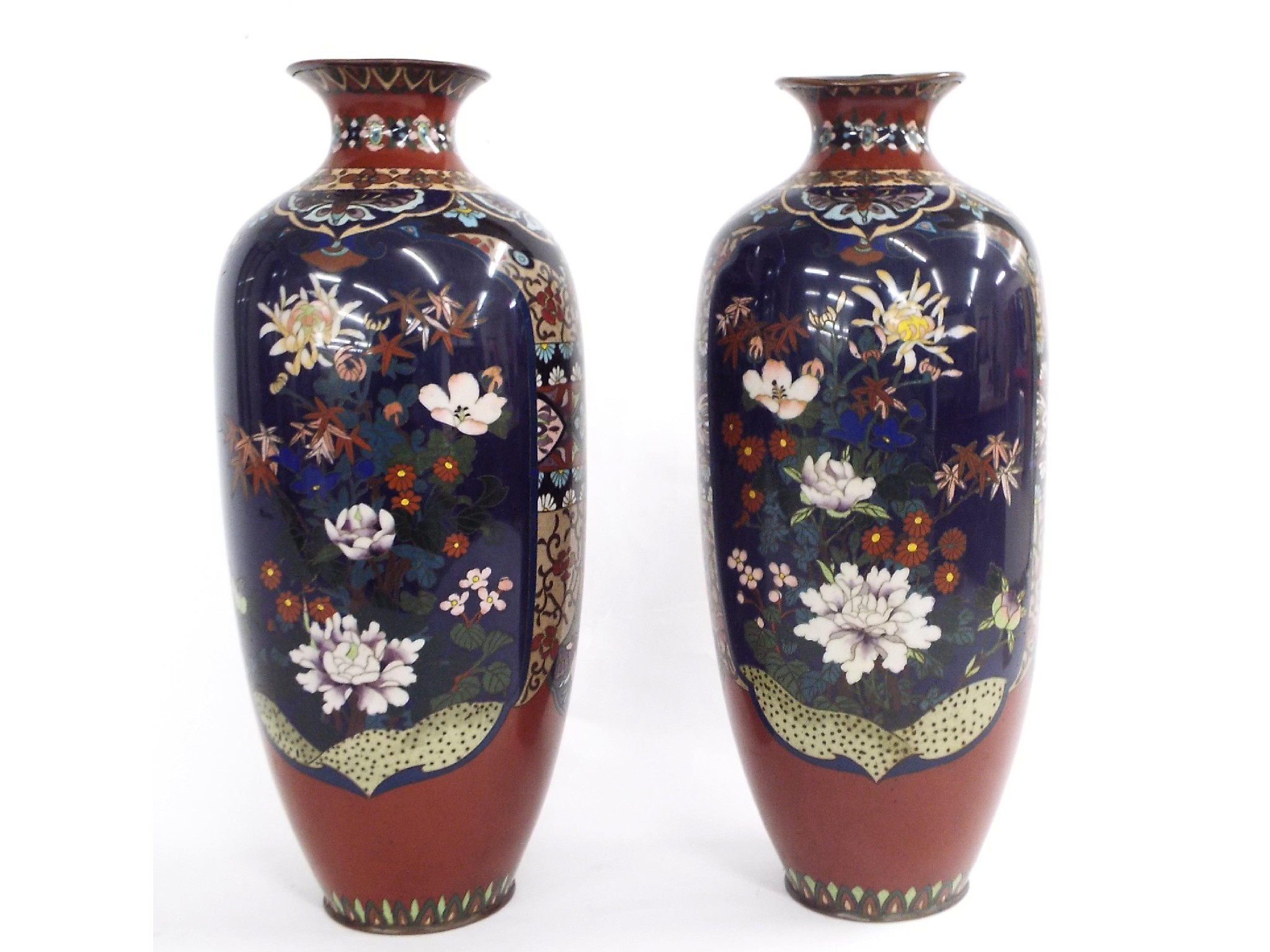 Appraisal: Pair of Japanese cloisonne baluster vases decorated with navy blue