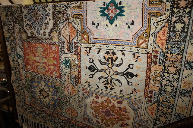 Appraisal: A HAMADAN WOOL RUG with multicoloured panels and geometric decoration