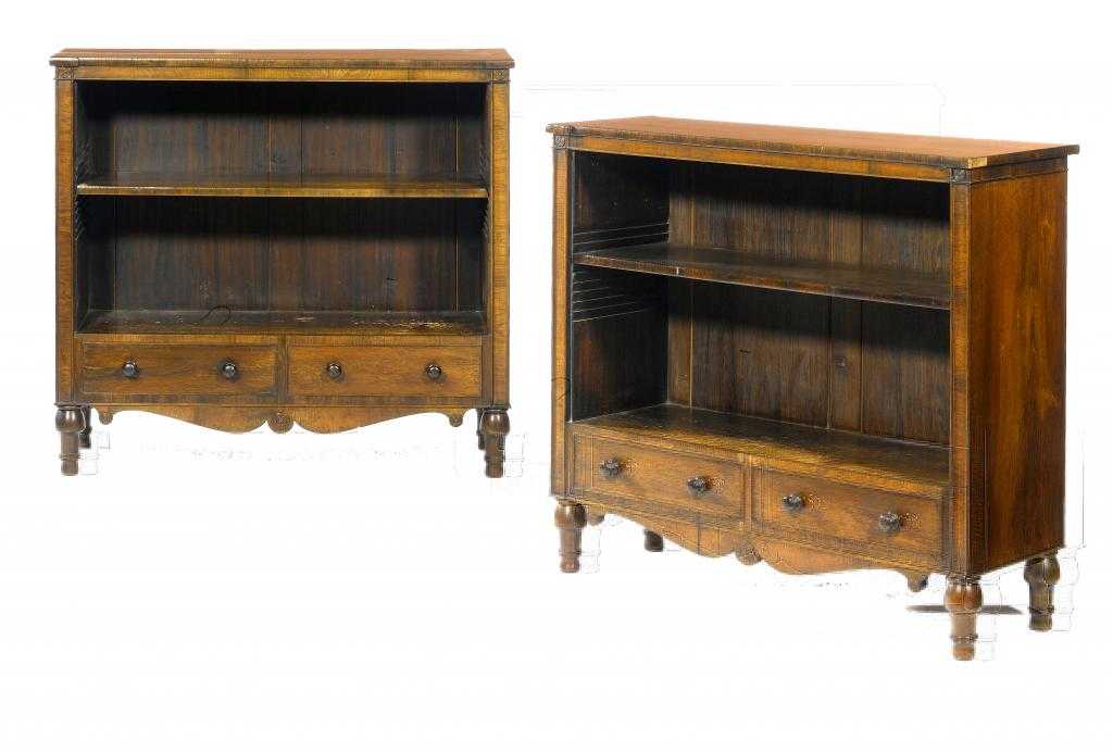 Appraisal: A PAIR OF ROSEWOOD OPEN BOOKCASES the flanking channelled pilasters