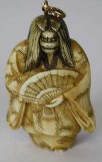 Appraisal: Japanese ivory netsuke- face changer- hannya which in Noh theater