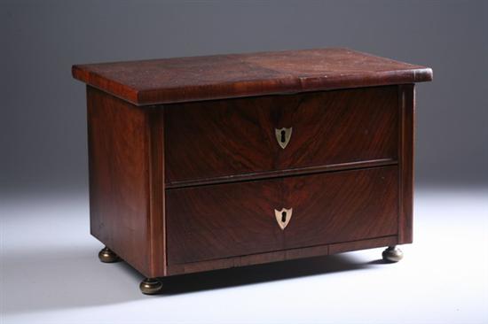 Appraisal: EMPIRE MAHOGANY JEWEL CABINET early th century Overhanging top two