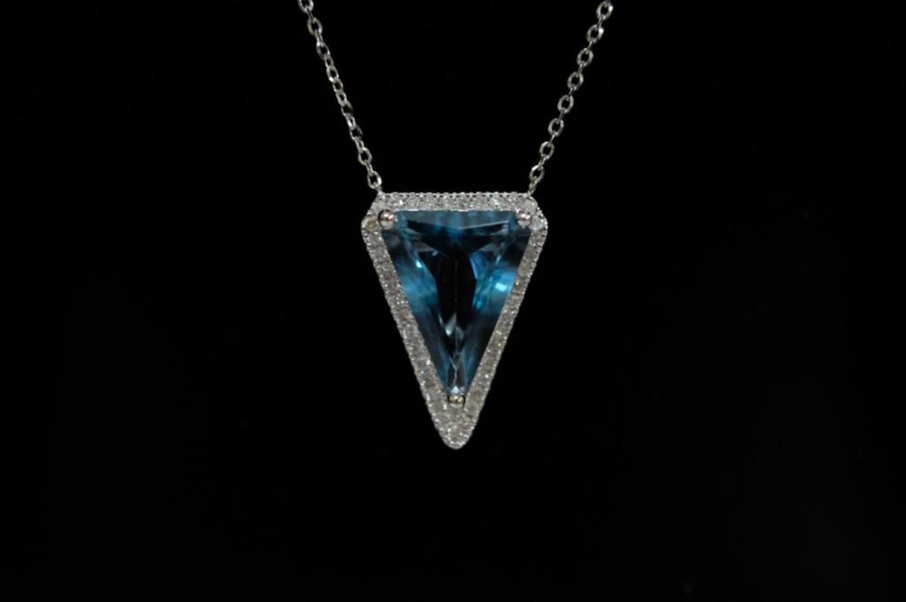 Appraisal: CT BLUE TOPAZ AND DIAMOND PENDANT k White gold pendant