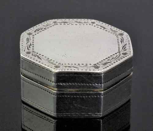 Appraisal: A George III silver octagonal vinaigrette with leaf engraved borders