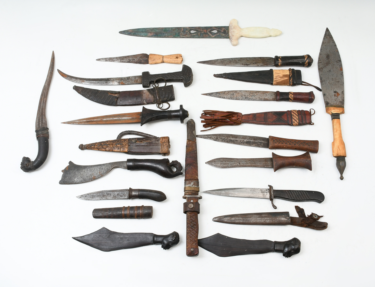 Appraisal: PC OLD KNIFE COLLECTION Comprising African wood figural knives Inlaid