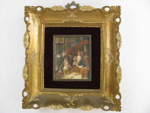 Appraisal: Depicts a couple eating with servant in background Painted celluloid