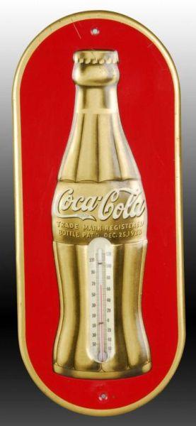 Appraisal: Coca-Cola Embossed Tin Thermometer- Gold Bottle Description A few minor