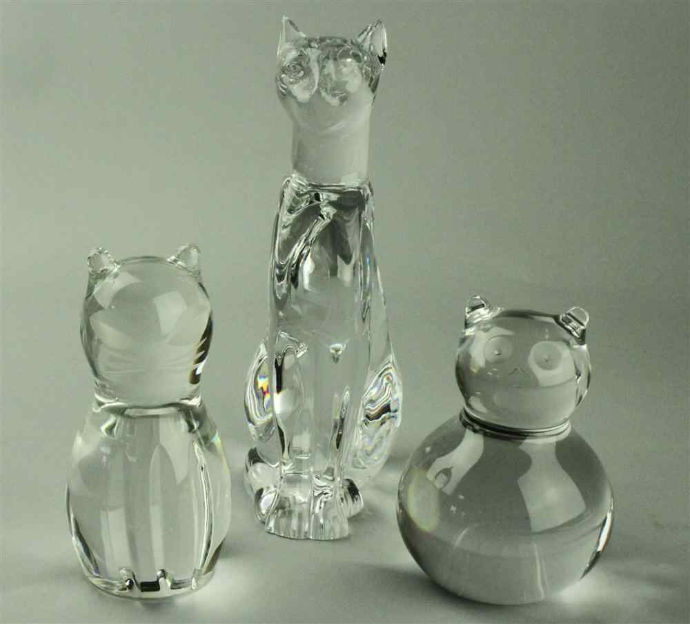 Appraisal: THREE GLASS CAT ORNAMENTS including one tall seated Baccarat one