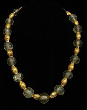 Appraisal: EARLY PERSIAN GLASS AND GOLD BEAD NECKLACE in Provenance Property