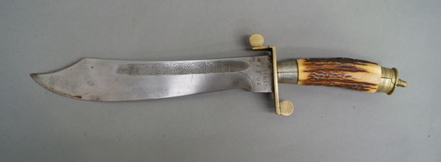 Appraisal: A large Bowie style knife German inch clip point blade