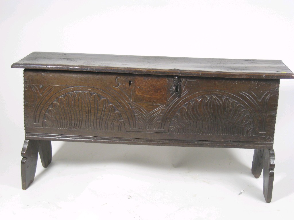 Appraisal: A th Century oak Sword Chest with fitted lockplate leafage