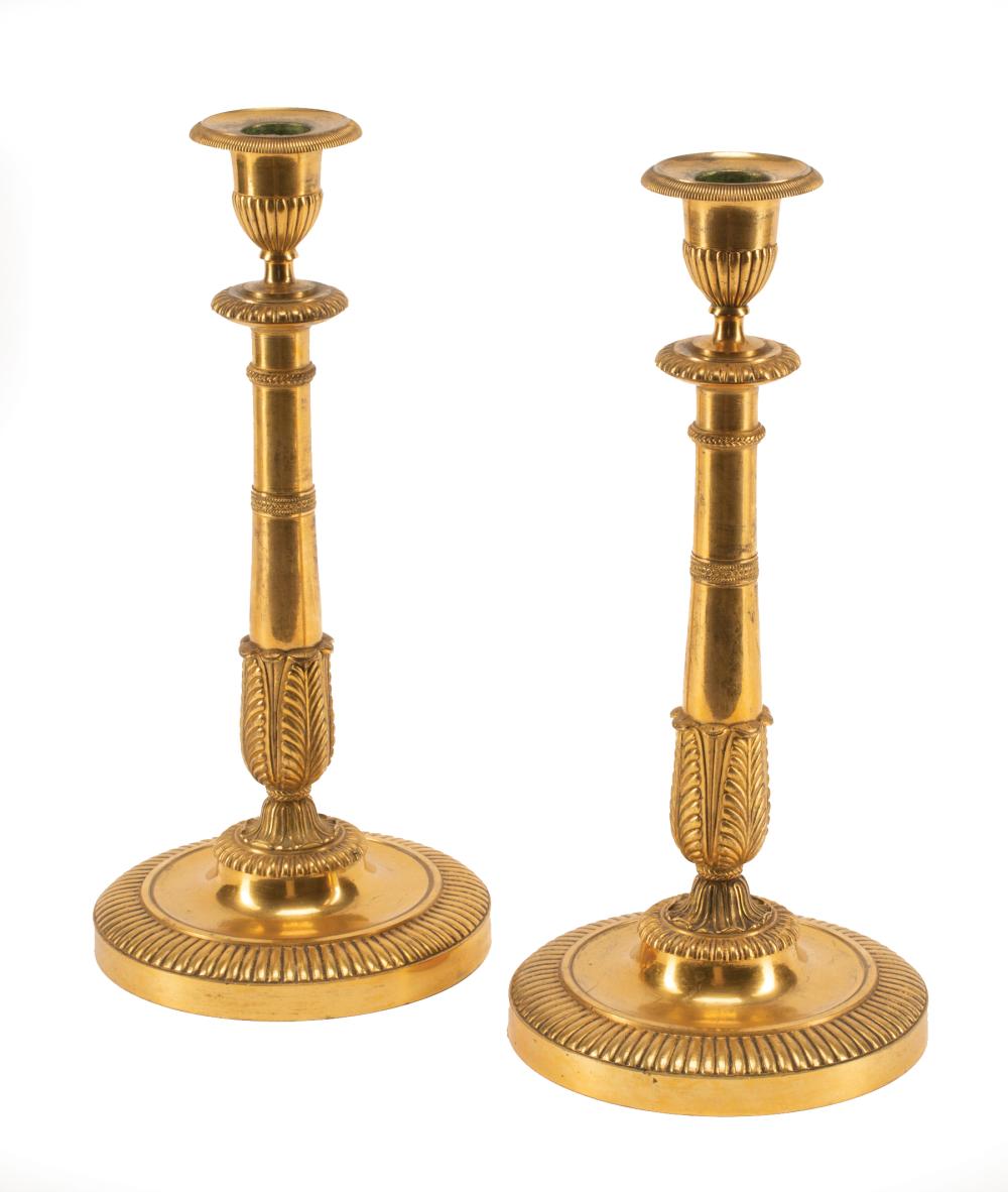 Appraisal: Pair of Charles X Bronze Candlesticks with reeding and palm