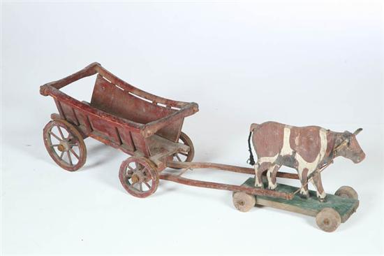 Appraisal: FOLKSY PULL TOY American th century Wooden ox and cart