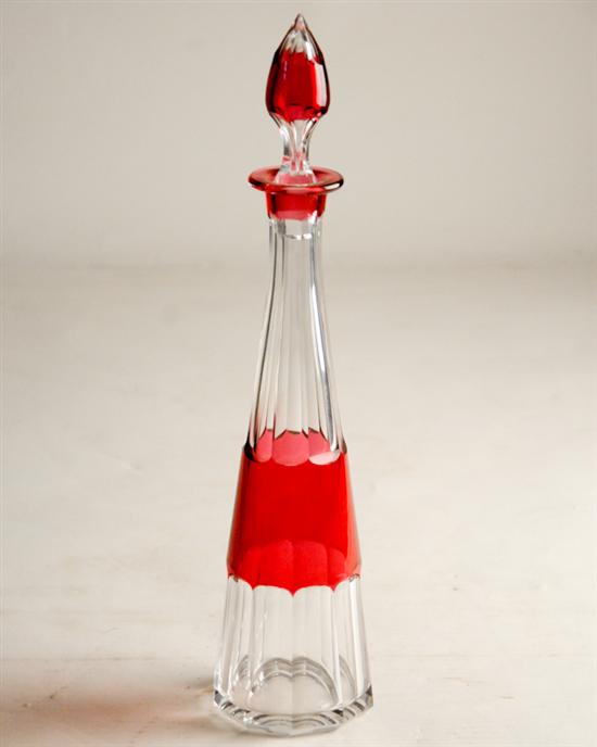 Appraisal: A Cased Art Glass Decanter translucent red and clear flame