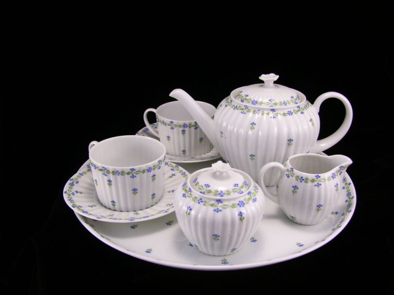 Appraisal: Limoges Tea Set w undertray Porcelain set includes Round undertray