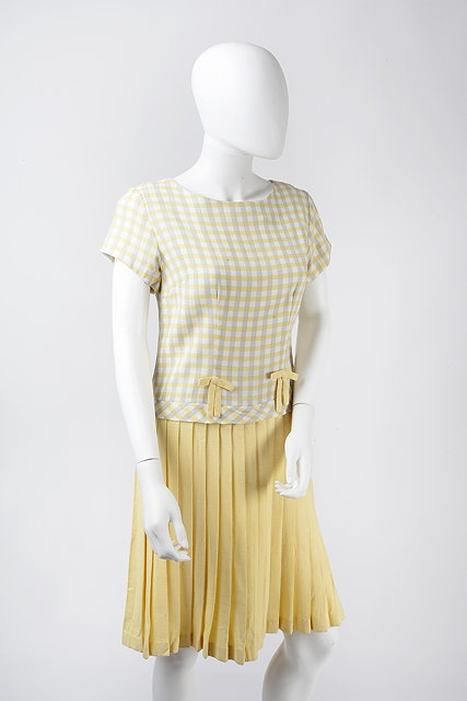 Appraisal: Two s day dresses the first yellow and grey checked