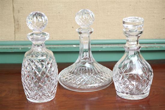 Appraisal: THREE WATERFORD DECANTERS All with matching stoppers Two possibly Lismore