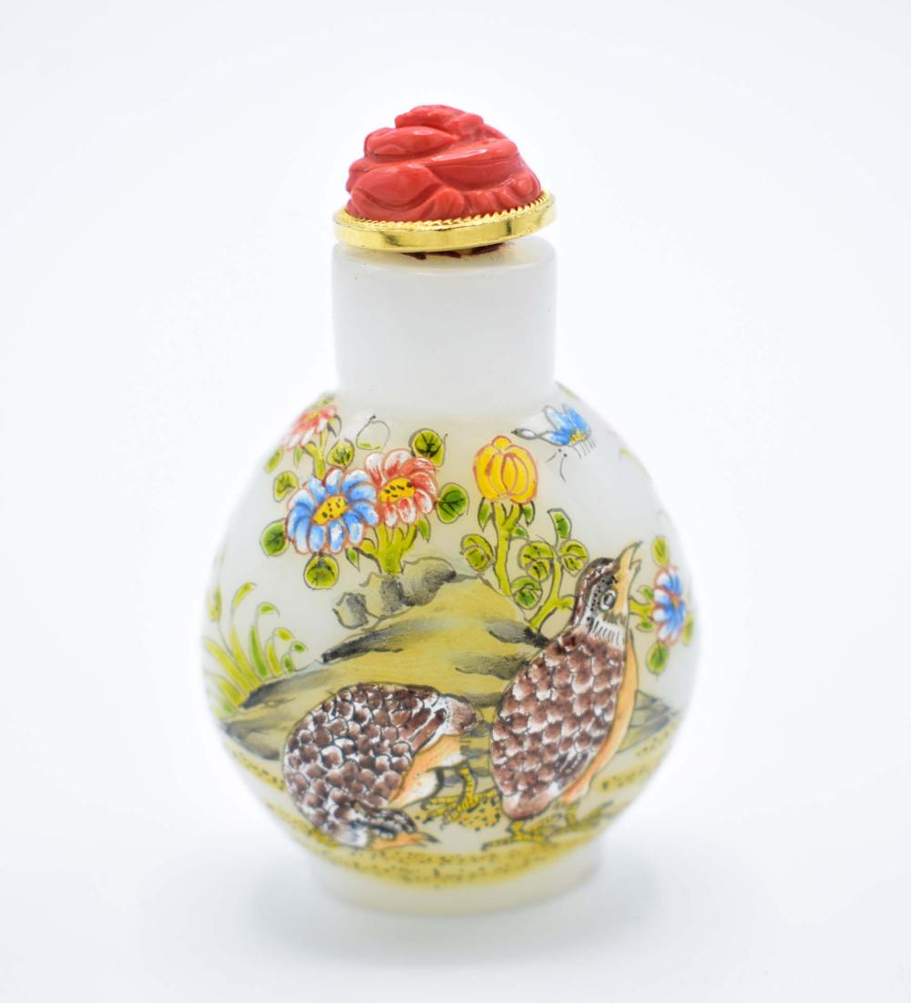 Appraisal: FINE CHINESE ENAMEL DECORATED WHITE GLASS SNUFF BOTTLEEach side decorated