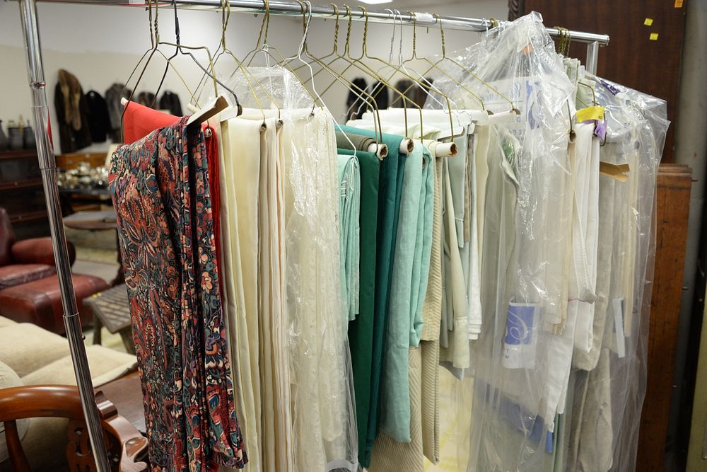 Appraisal: Rack of tablecloths and linens some large Rack of tablecloths