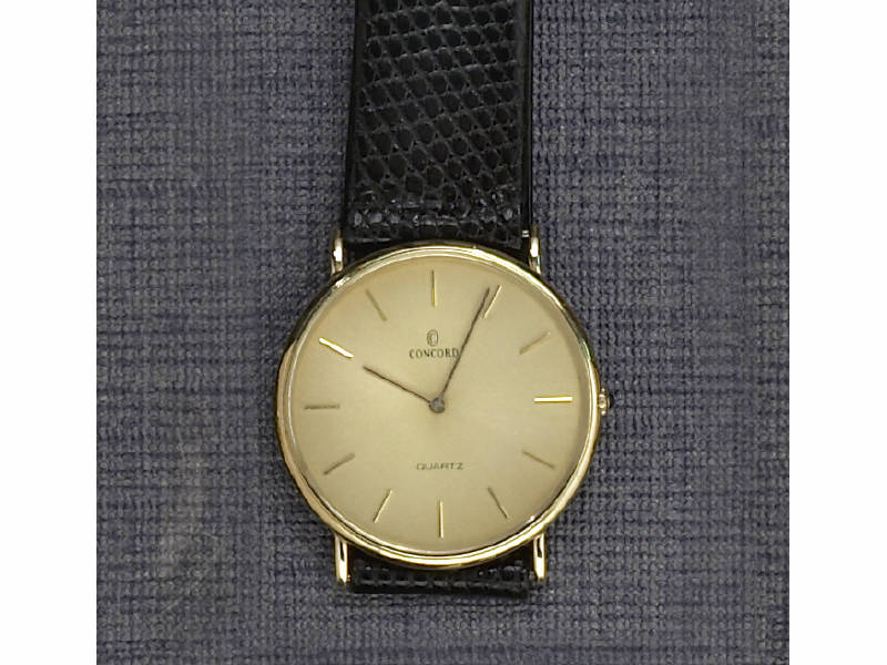 Appraisal: GOLD CONCORD WATCH k yellow gold man's thin quartz Concord