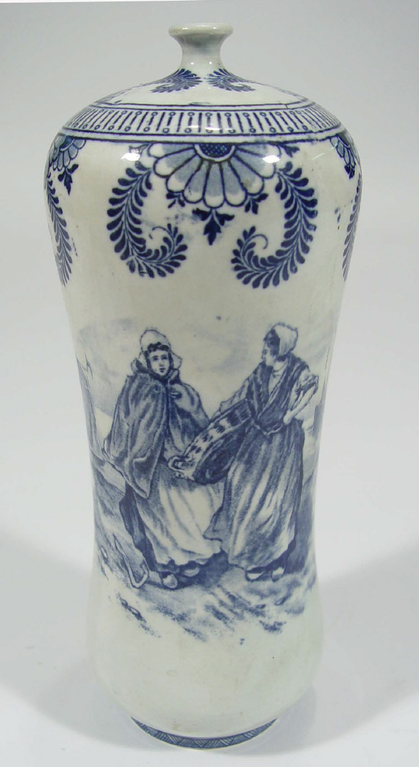 Appraisal: Delft pottery bottle vase decorated with blue women at a