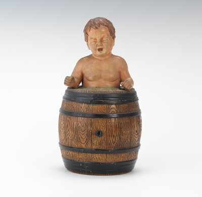 Appraisal: Figural Composite Tobacco Jar Baby in a Barrel by Johann