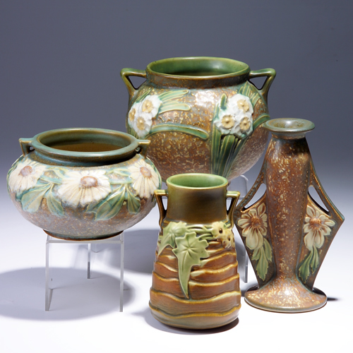 Appraisal: Four ROSEVILLE pieces to include a brown Luffa vase a