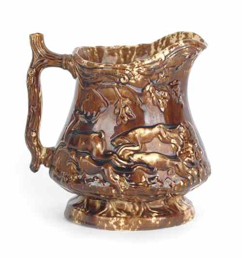 Appraisal: Rockingham glazed pitcher th c with interior frog and exterior