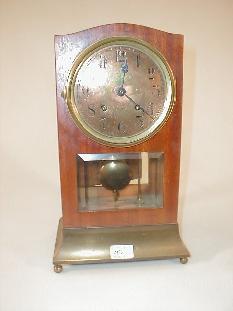 Appraisal: An early thC mahogany and brass mantel clock with bevelled